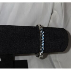 Vintage Sterling Silver .925 Hinge Bangle with blue topaz. 7 inch